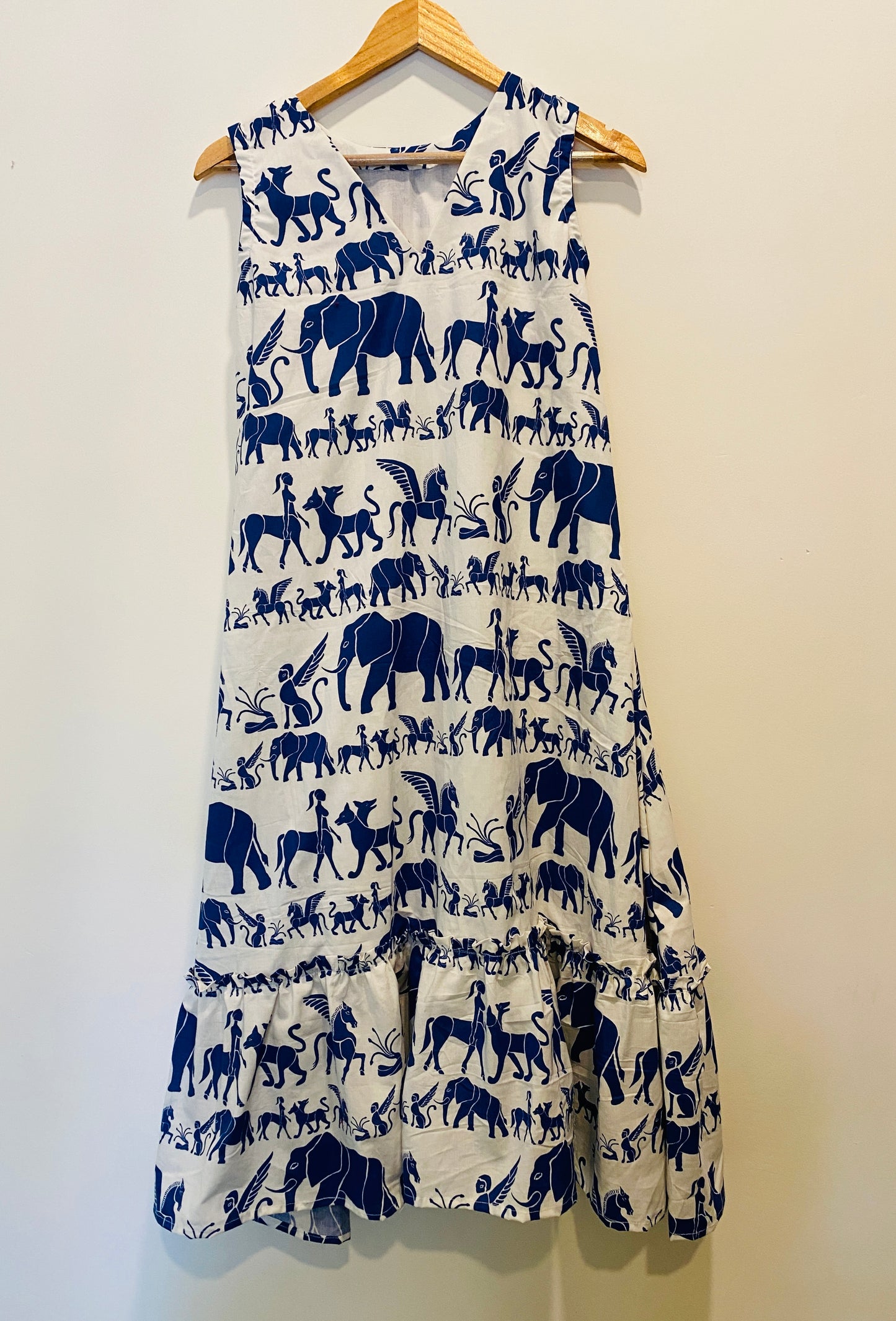 DS86 Poplin animal print dress with bottom flairs