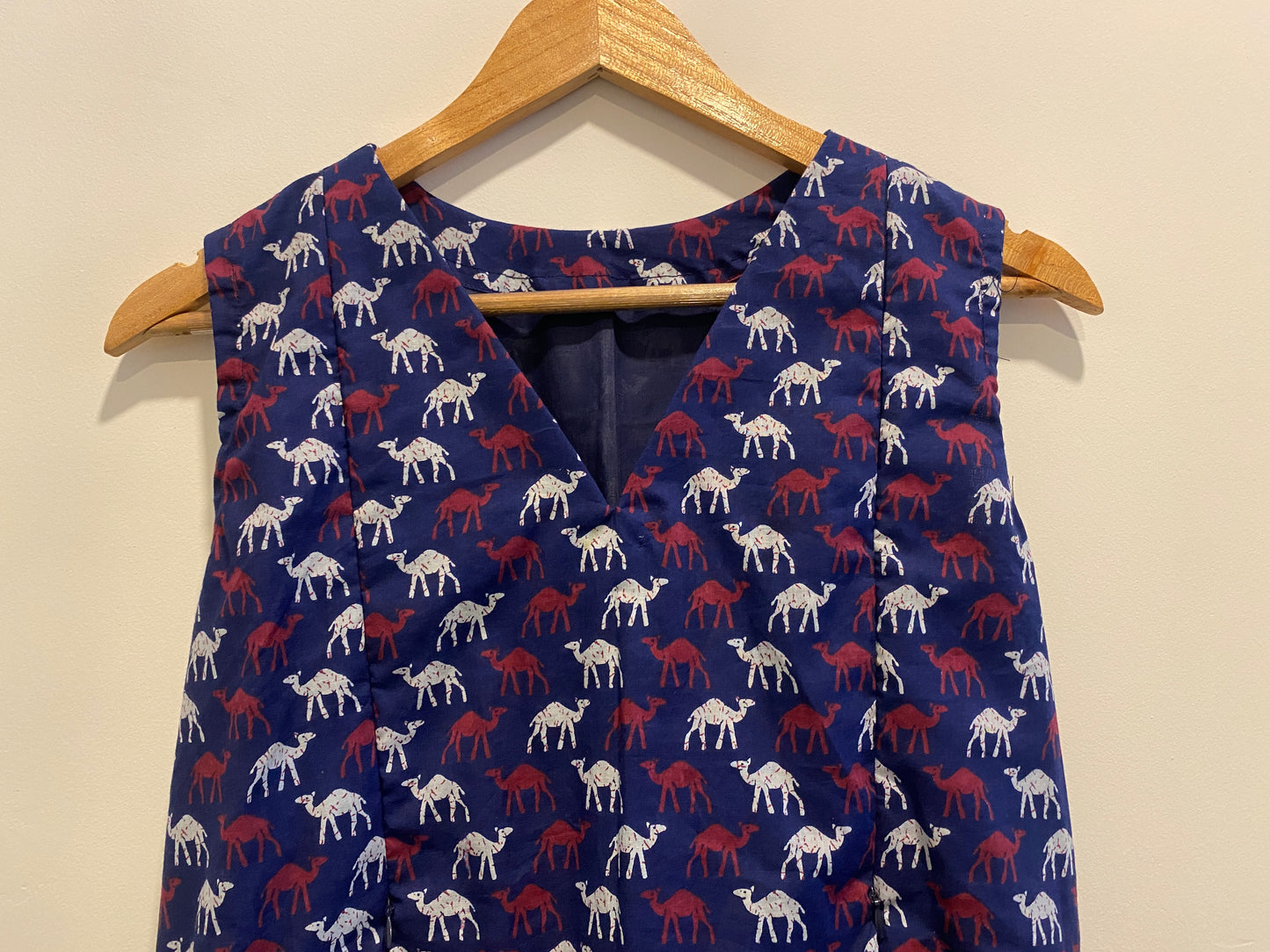 DS71 Vneck with bottom frills Camel print design dress