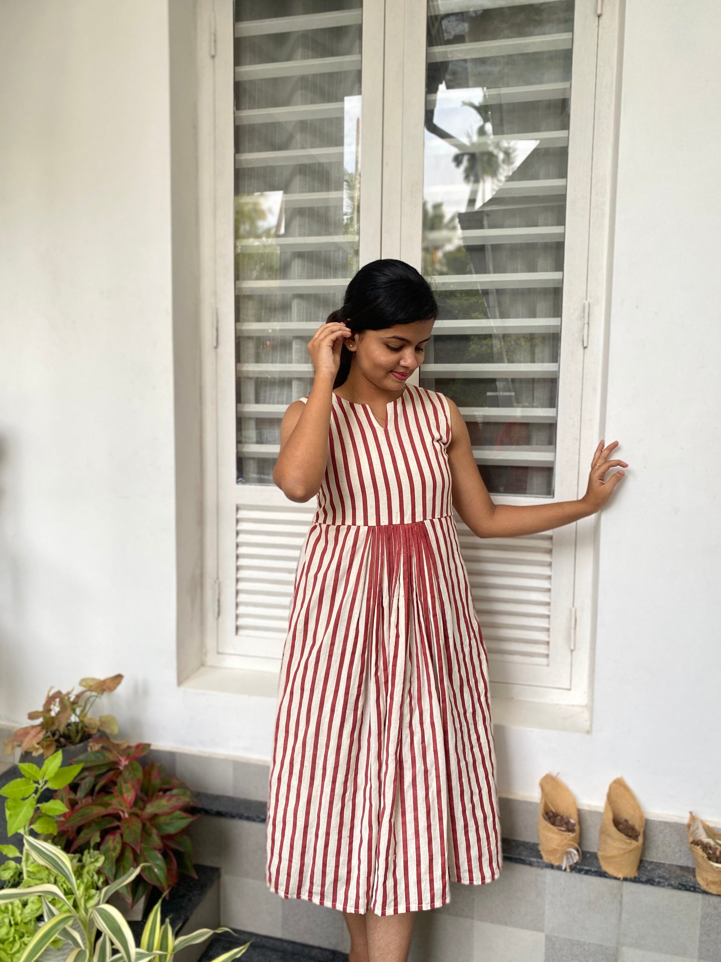 DS72 Red stripe dress with centre pleates