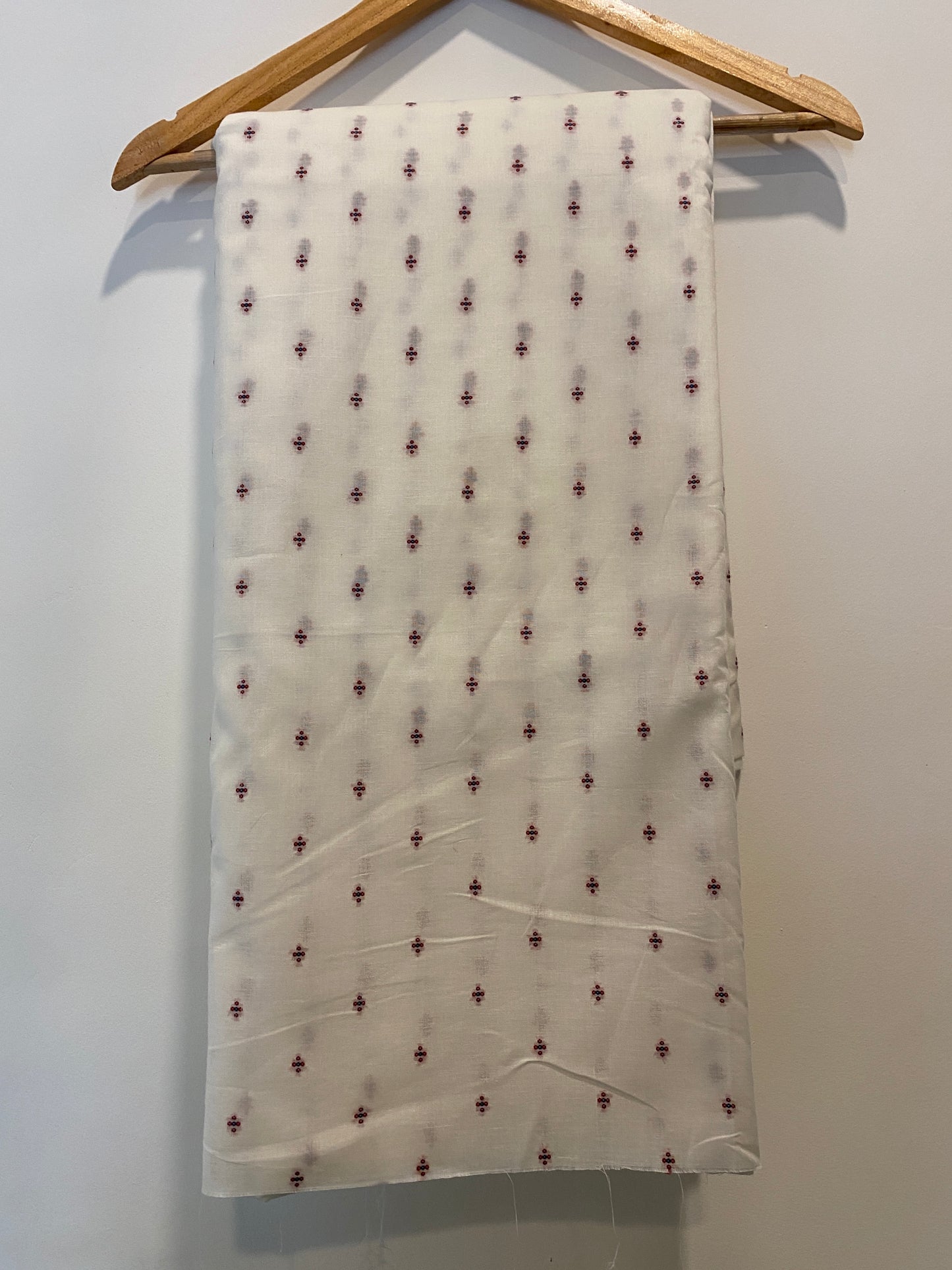 FBR064 Red embroidery on cream cotton fabric